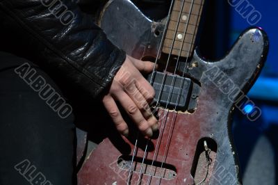 Playing old bass guitar