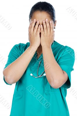 Doctor with the hands in the face