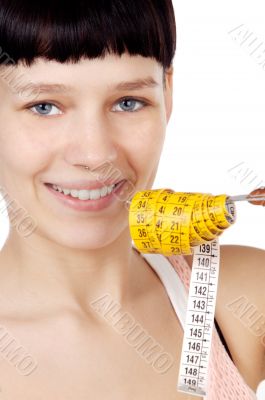 attractive girl with tape measure