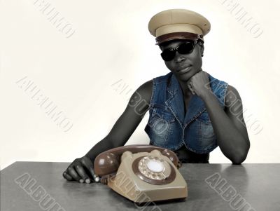 African girl with old phone