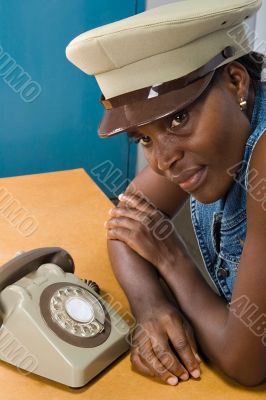 African girl with old phone
