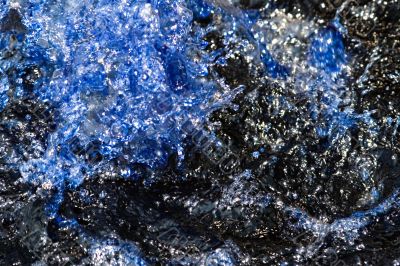 Blue water splash