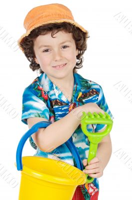 adorable boy playing in the beach
