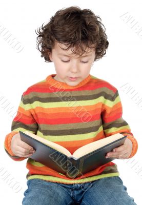 Adorable boy studying