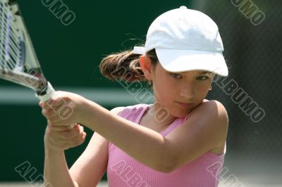 Girl playing tennis
