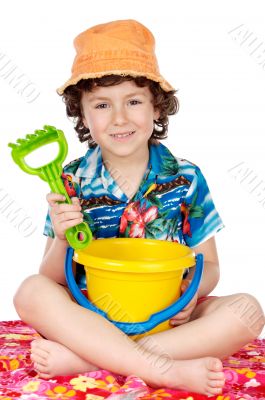 adorable boy playing in the beach