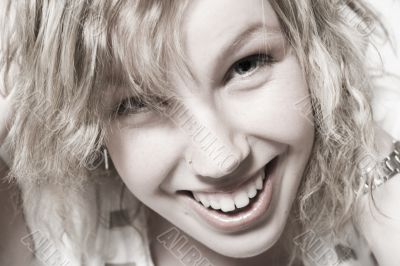 Portrait of a beautifull curly blond