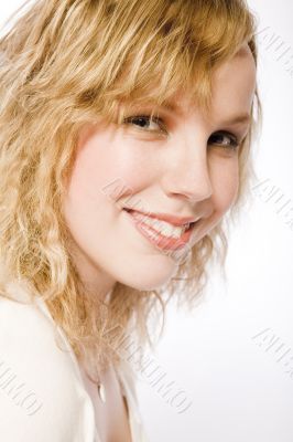 Portrait of a beautifull curly blond