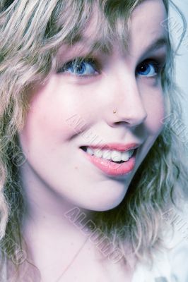 Portrait of a beautifull curly blond