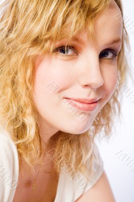 Portrait of a beautifull curly blond