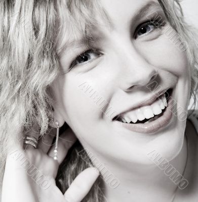 Portrait of a beautifull curly blond