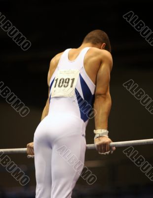 Gymnast on high bars