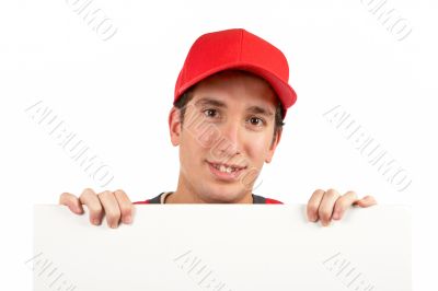 Curious teen behind white placard