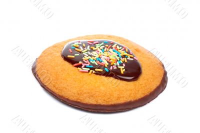 Cake with chocolate syrup and sweets