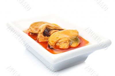 Mussels in a white dish