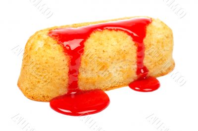 Strawberry syrup over a cake