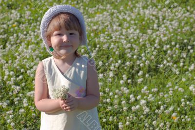 Girl with bouquet of clover