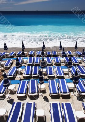 loungers on the beach - portrait