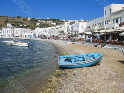 Boat on Beach in Front of town