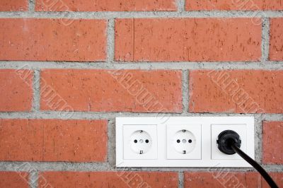 Brick Wall w/ Power Outlet
