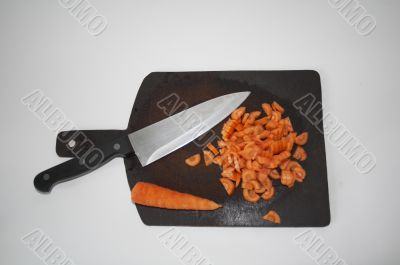 cutting board with carrot and knife