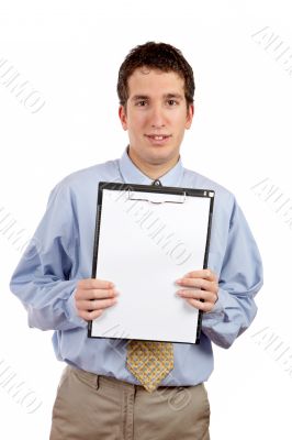 Smiling businessman showing a clipboard