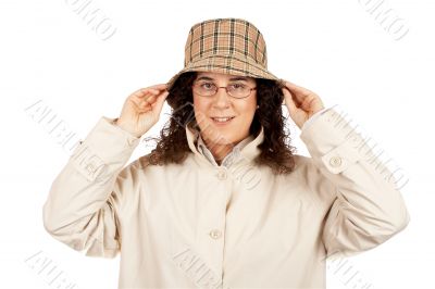 Woman holding hat