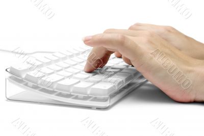 Hands on a White Computer Keyboard