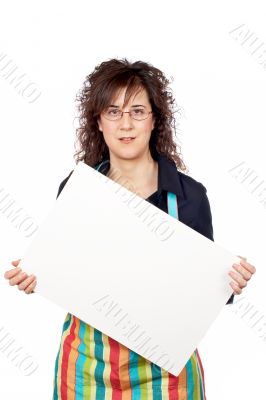 Housewife in apron holding the blank poster