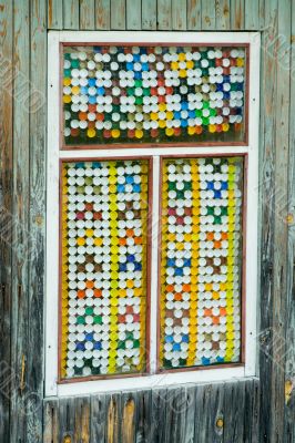 Old window decorated by fuses