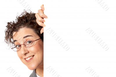 Business woman behind the  blank billboard