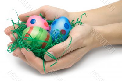 Holding Three Easter Eggs