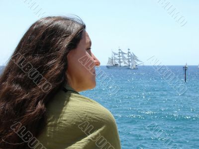 Expectation. The woman looking at the sea