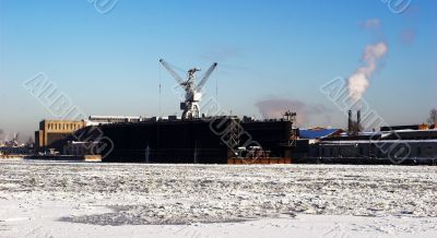 Winter water area of a factory with dry dock