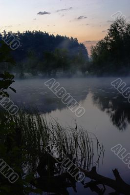 Morning fog above lake