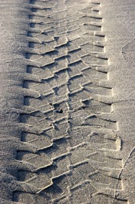 Tire track in the sand