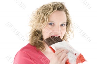 Young blond girl sneezing in the handkerchief