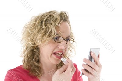 Attractive blonde with glasses and a lipstick