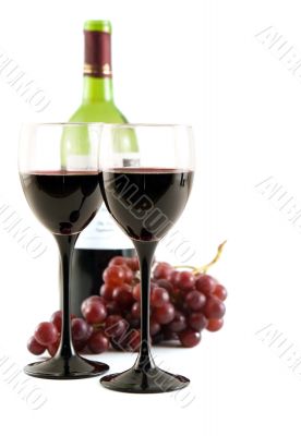 Red wine and grapes