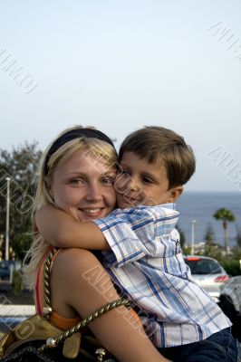 Smiling Boy and mom in the summer holliday