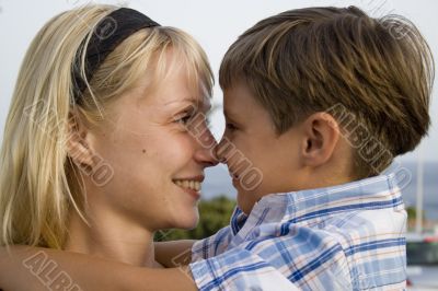  Smiling Boy and  happy mom in the summer holiday