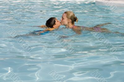  Kissing son and mom in the pool