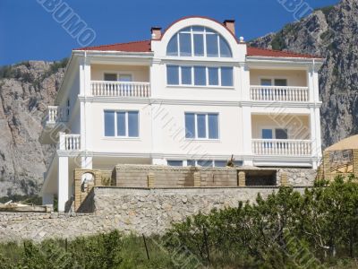 Stone cottage in mountains