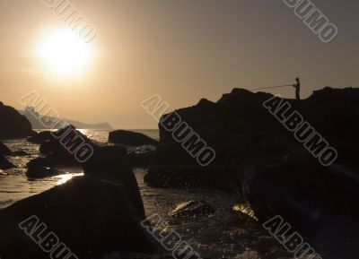 Silhouette of the fisherman
