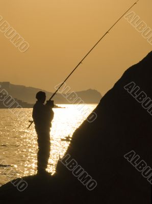 Silhouette of the fisherman