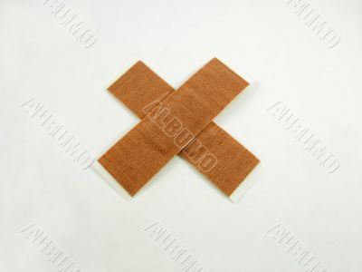 Fabric Bandages Make an X