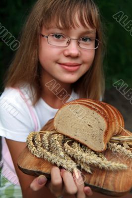 Girl with fresh bread