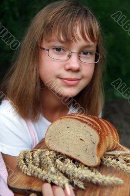 Girl with fresh bread