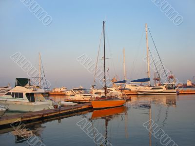 Yellow yacht in dock