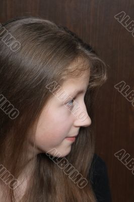 Half face portrait of teenage girl